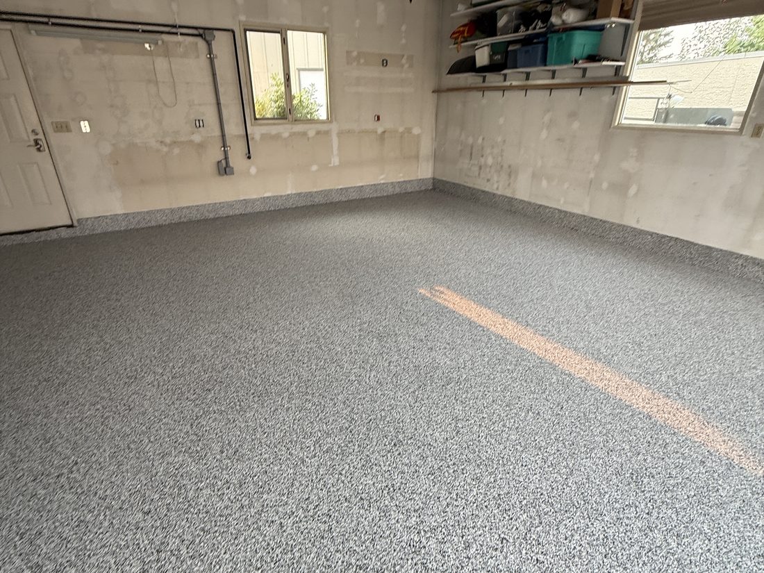 Coyote flake floor — garage mid-cure, tools staged